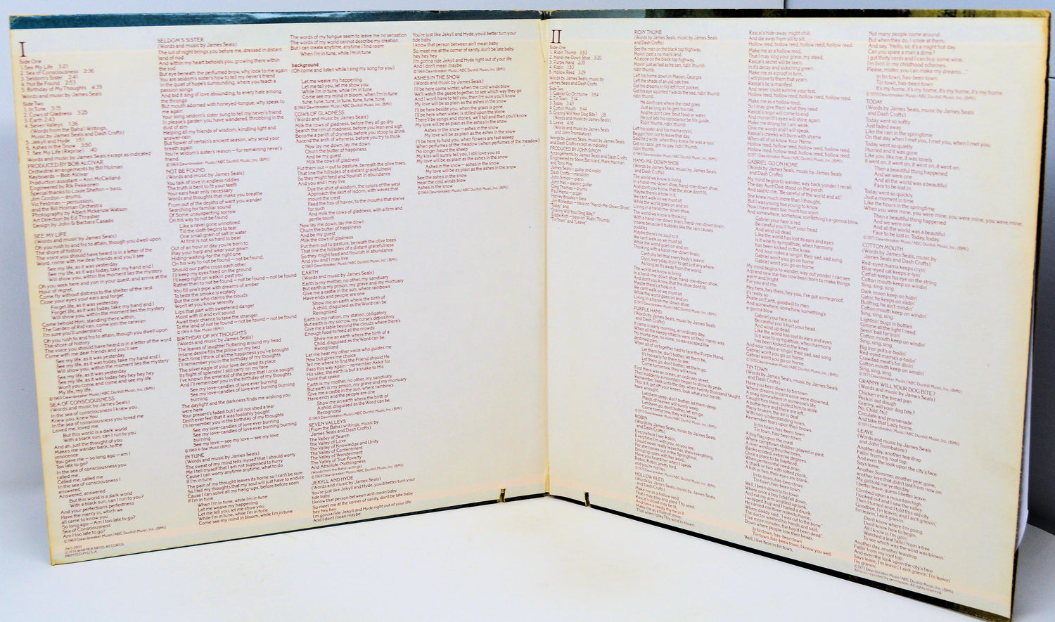Open book with text on a white background