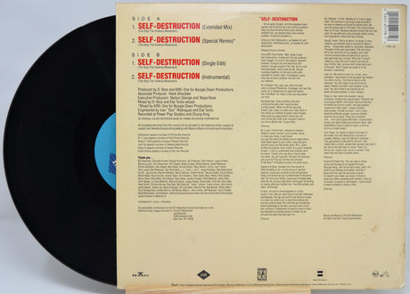 Back cover of Self Destruction vinyl showing tracklist, credits, and lyrics by the Stop the Violence Movement