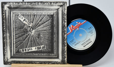 Vinyl record with 'Virgin' label and cover featuring a stylized design.