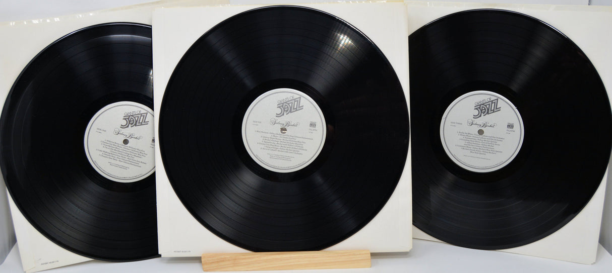 Three 'Giants of Jazz: Sidney Bechet' vinyl records displayed in white sleeves