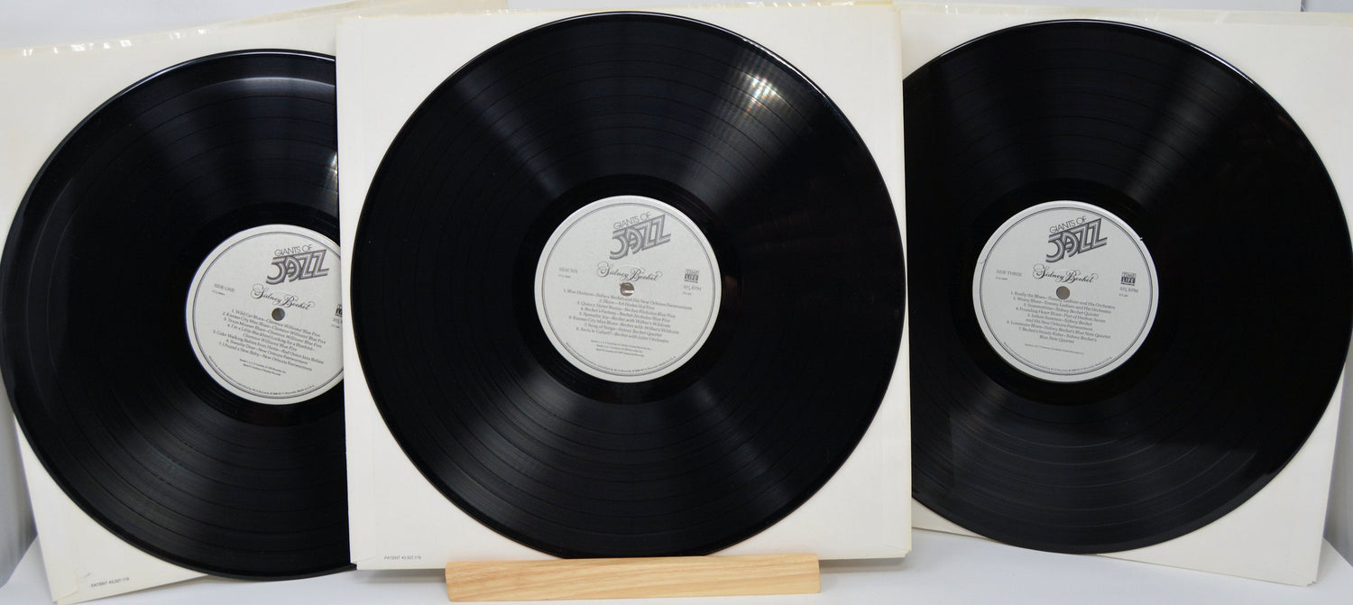 Three 'Giants of Jazz: Sidney Bechet' vinyl records displayed in white sleeves