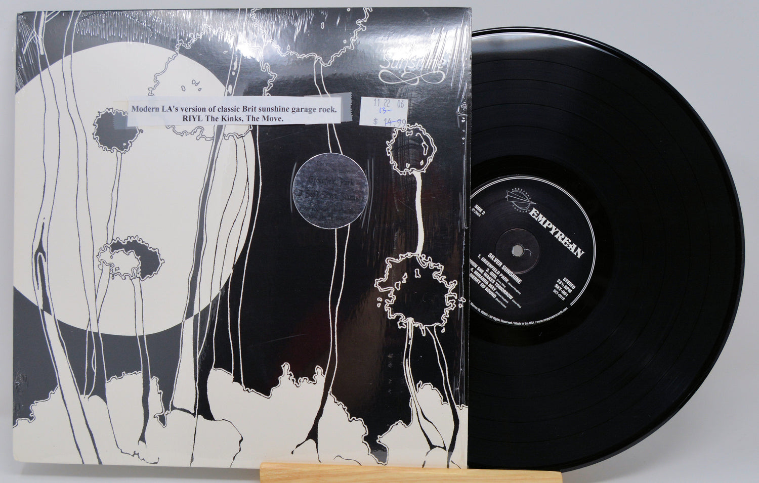 Front cover of Silver Sunshine LP with vinyl record and psychedelic floral artwork