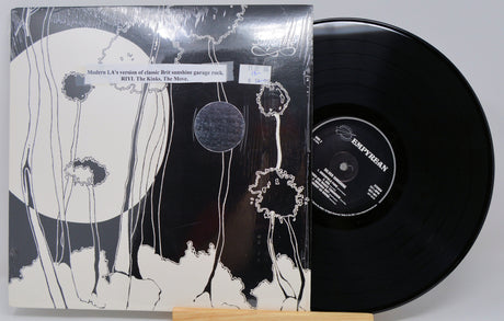 Front cover of Silver Sunshine LP with vinyl record and psychedelic floral artwork