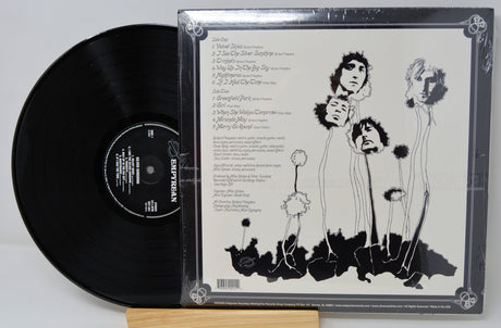 Back cover of Silver Sunshine vinyl record featuring band info and artistic flower illustrations