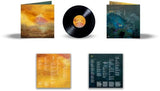 Vinyl record with matching cover and insert on a white background