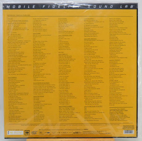The back cover of a vinyl record sleeve, featuring a bright yellow background with dense black text listing track information and credits. The top banner reads 'MOBILE FIDELITY SOUND LAB'.