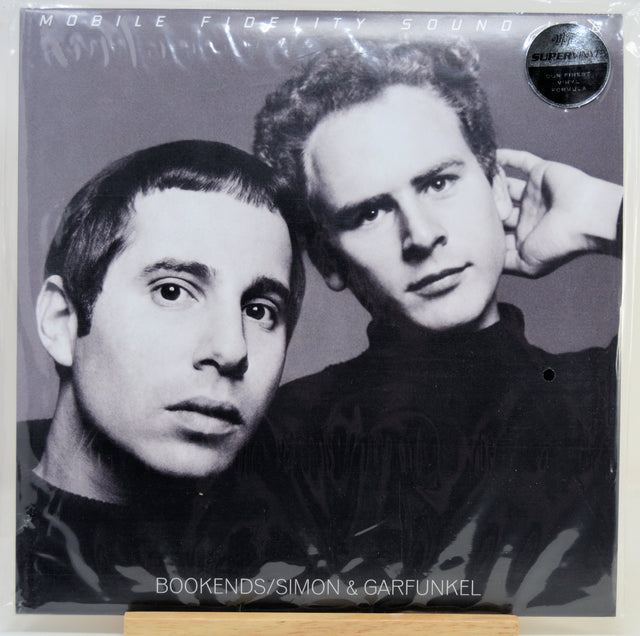 Vinyl record sleeve for Simon & Garfunkel's 'Bookends', featuring a black-and-white double portrait of the two band members. The top edge shows 'MOBILE FIDELITY SOUND SYSTEM' and a circular 'MoFi Supervinyl' sticker.