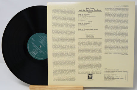 Vinyl record with text on a white background