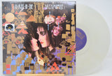 Clear Vinyl record 'Siouxsie The Banshees A Kiss In The Dreamhouse' with colorful cover featuring two faces and abstract designs.