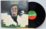 Vinyl record album for 'Texas Tornado' by The Sir Douglas Band, showing the illustrated cover sleeve and the black LP disc partially pulled out, with a visible colored center label.