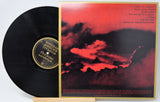 Six Organs of Admittance The Sun Awakens LP vinyl record beside vivid red cloud album art