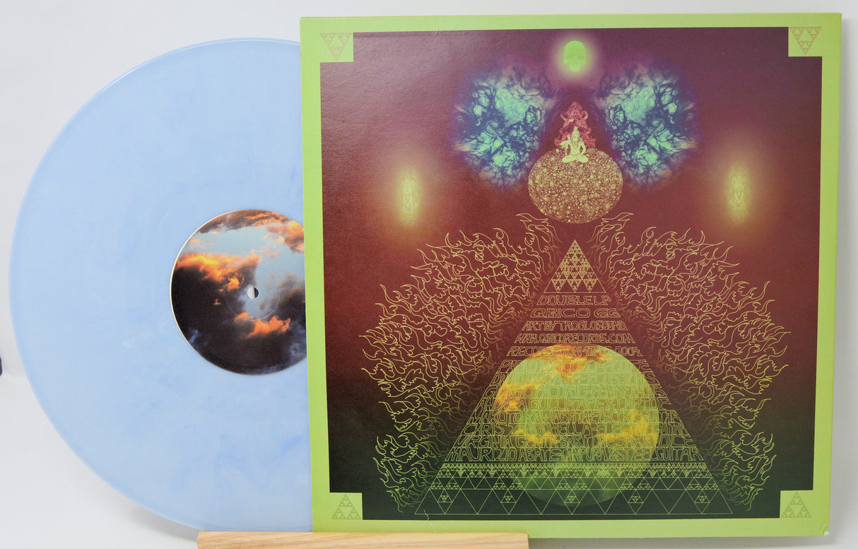 Limited edition sky blue vinyl LP beside vibrant psychedelic album cover art