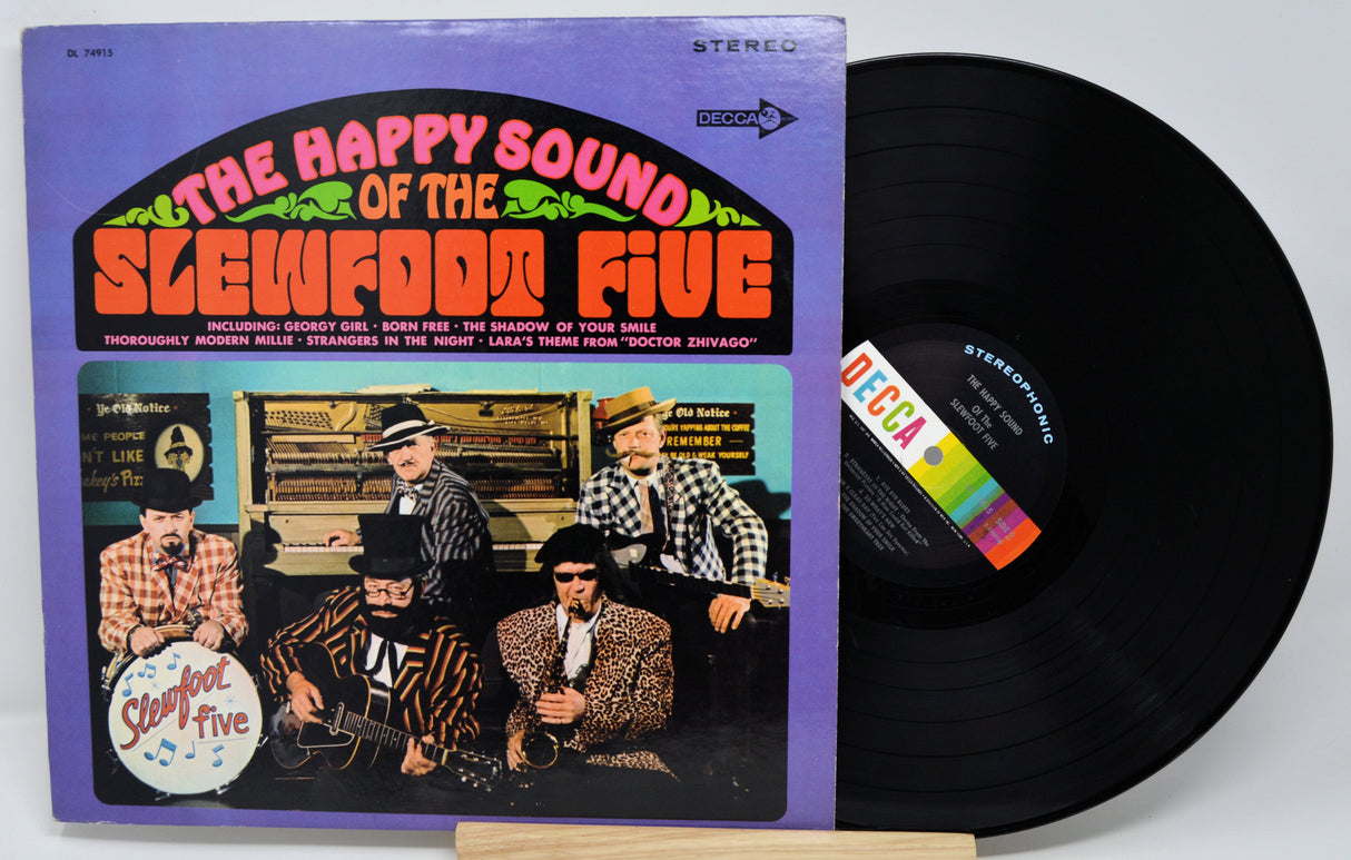Vinyl record with cover featuring 'The Happy Sound of the Slew Doom Five' on a white background