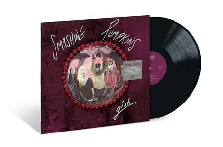 Vinyl record with a purple cover featuring the band 'Smashing Pumpkins' on a white background.