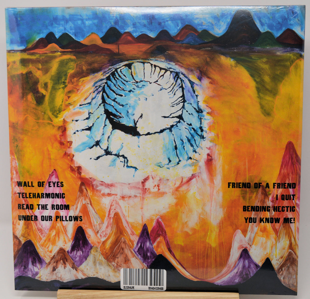 Vinyl record cover with abstract art and text