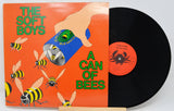 Vinyl record with cover featuring a hand holding a can of bees and text 'The Soft Boys A Can of Bees'.