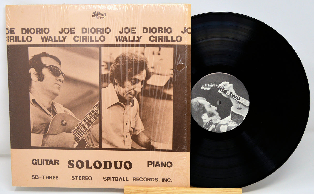 Front cover of Soloduo vinyl LP by Wally Cirillo and Joe Diorio, showing artists and record.