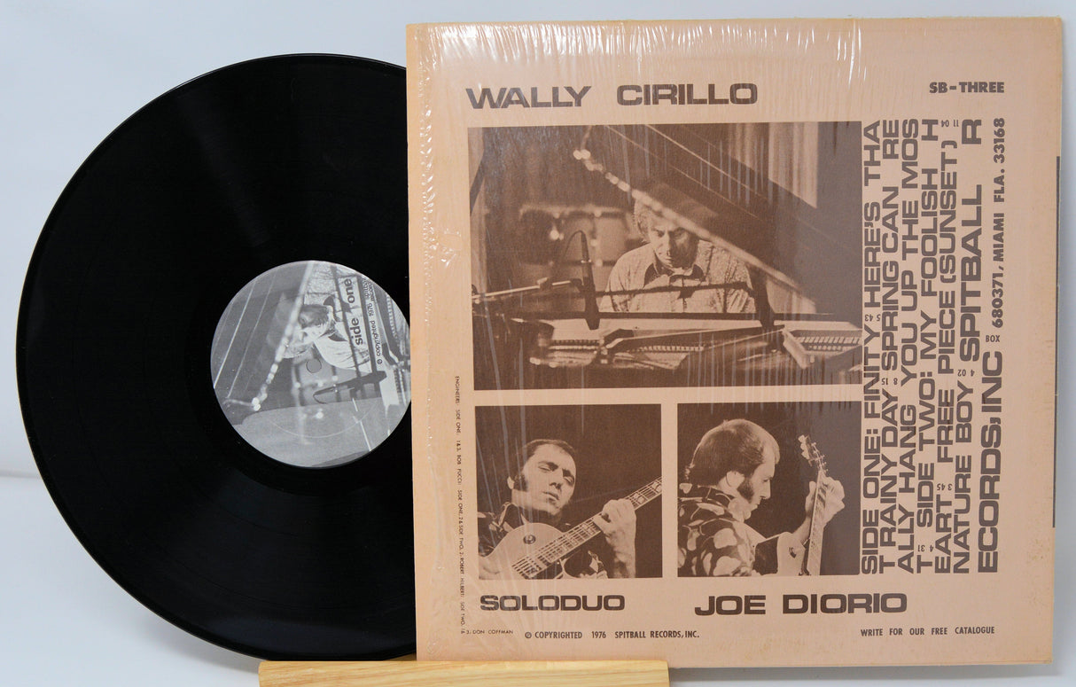 Vintage Soloduo vinyl LP with record by Wally Cirillo and Joe Diorio, jazz album back cover and record displayed.