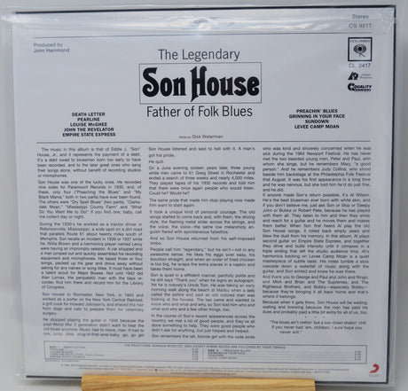 The back cover of a vinyl record sleeve for 'The Legendary Son House: Father of Folk Blues' on Columbia Records, featuring multiple columns of text, artist credits, and track listings on a white background.