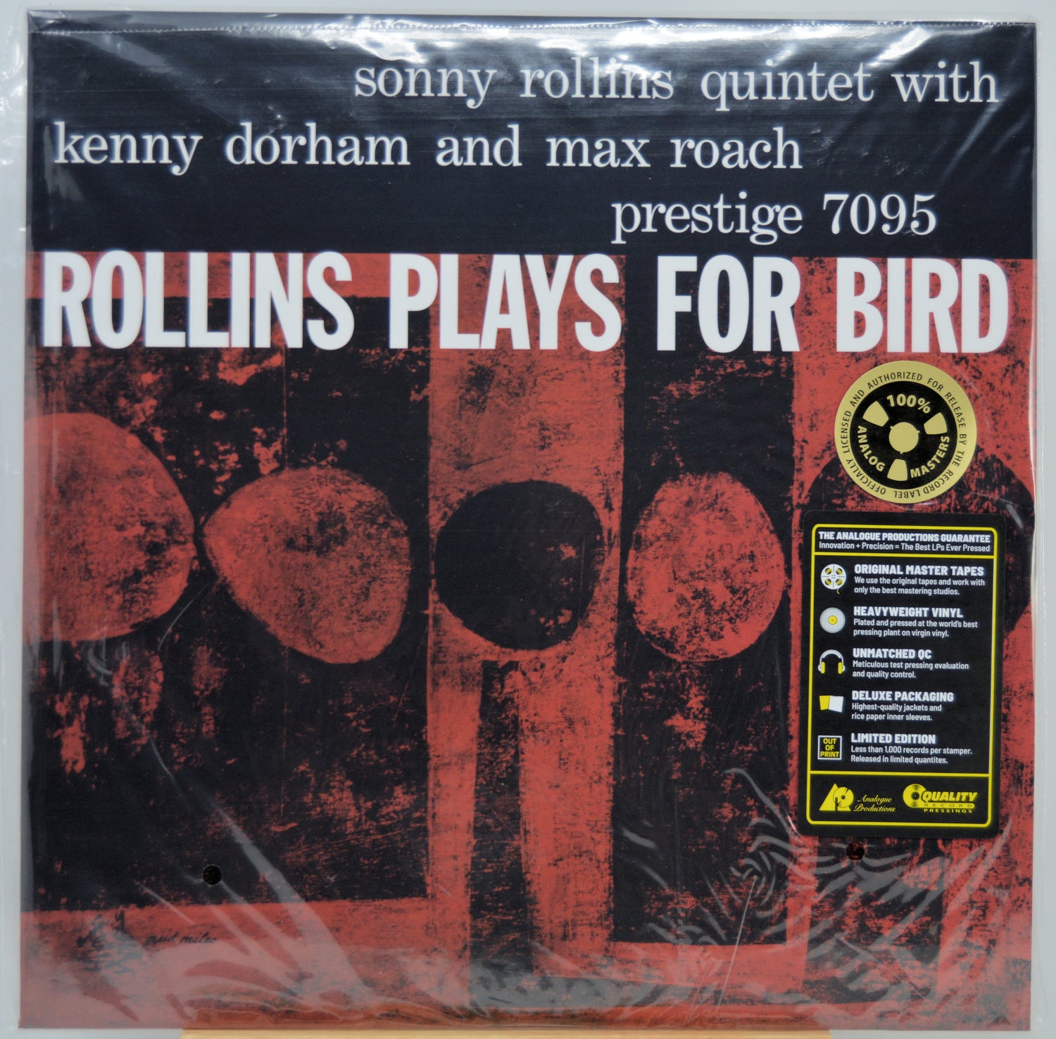 Vinyl record album cover for 'Rollins Plays For Bird' by the sonny rollins quintet, featuring a black and red abstract design with white text and a yellow Prestige 7095 sticker on the right.
