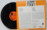 Vinyl record with orange cover featuring 'Sonny Terry' text