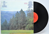 'Sons Of Champlin Welcome To The Dance' Vinyl record and back cover with pine trees and landscape that includes song titles in text.