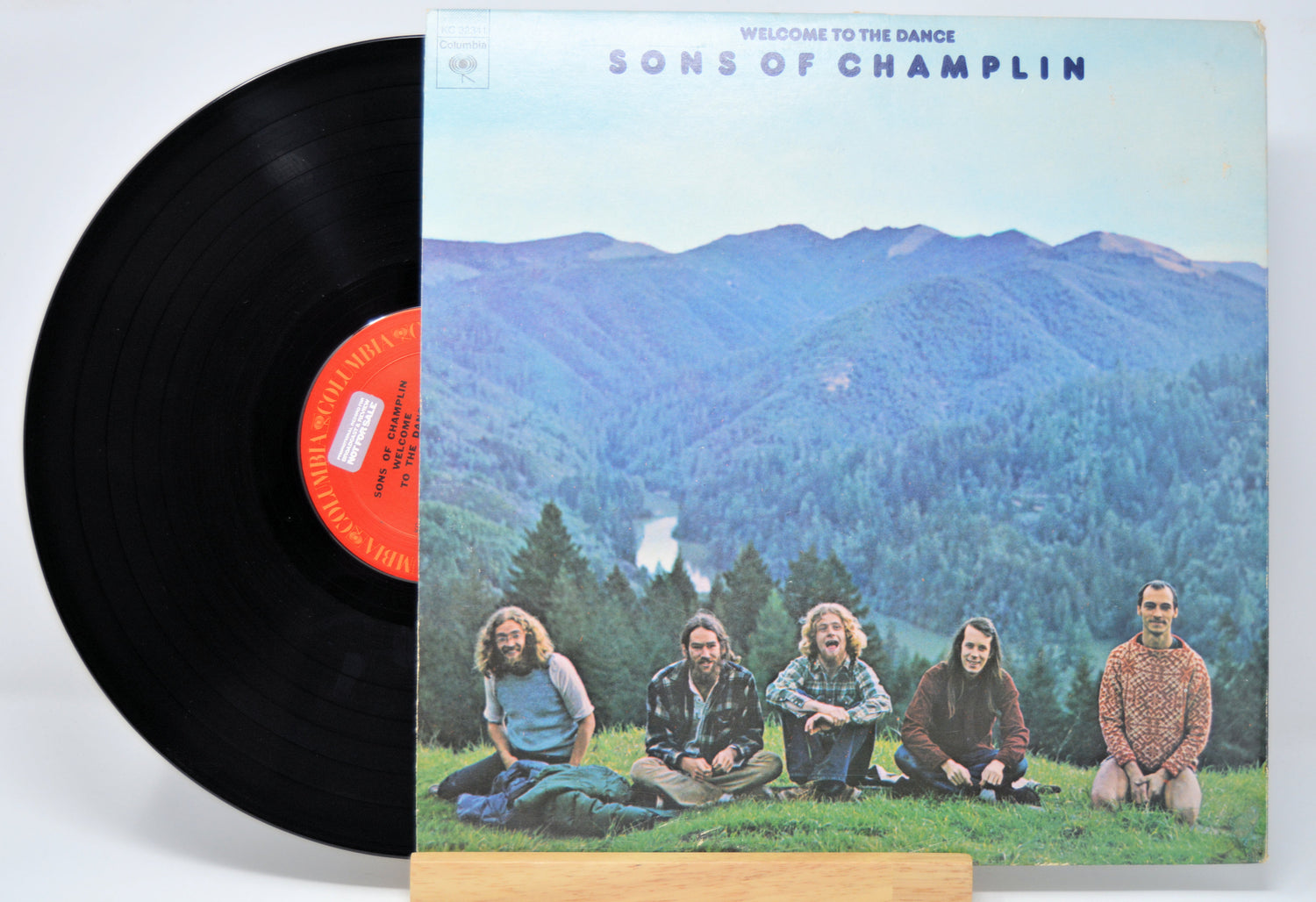 'Sons Of Champlin Welcome To The Dance' Vinyl record and front cover with pine trees and mountain landscape with the band sitting in front.