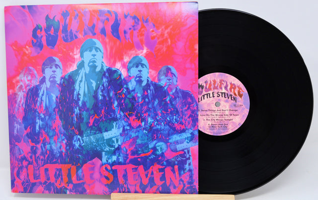 Front cover of Soulfire vinyl LP showing psychedelic image of Little Steven surrounded by flames