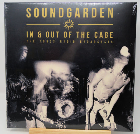 Soundgarden 'In & Out of the Cage: The 1990s Radio Broadcasts' vinyl record cover, shrink-wrapped and displayed upright on a small wooden stand against a light gray background.