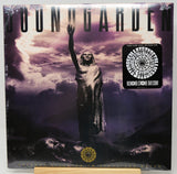 Soundgarden 'Fallen' CD album cover, sealed in plastic shrink wrap with a collectible sticker on the right, displayed on a wooden stand against a white background.