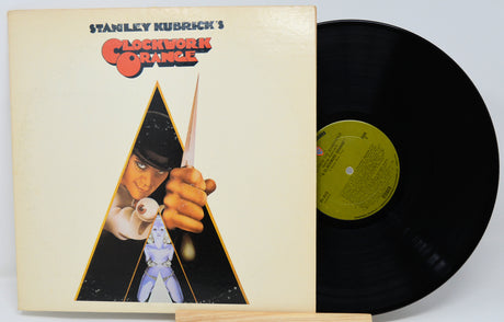 Vinyl record with 'A Clockwork Orange' cover featuring a stylized illustration of a character holding a knife.