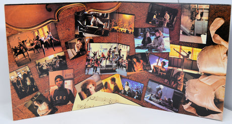 Memorabilia book with various photos and images on a white background