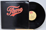 Vinyl record and cover with 'Fame' branding on a white background