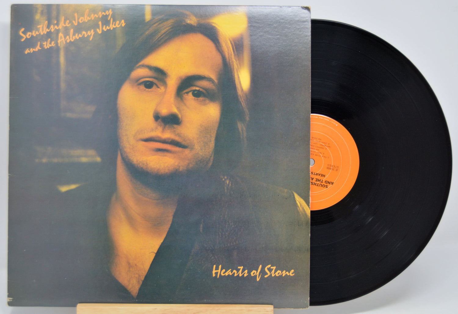 'Southside Johnny' Vinyl record with a cover featuring a person's face and album title 'Hearts of Stone'.