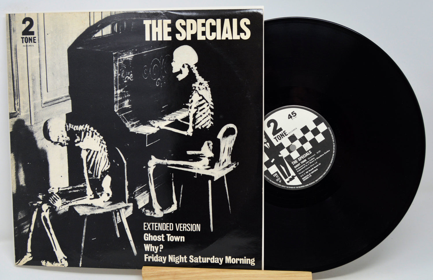 Vinyl record with cover featuring skeletons and 'The Specials' branding