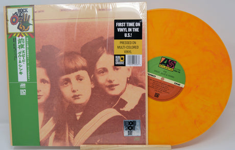 Front cover of Speed, Glue & Shinki 'Eve' with orange marbled vinyl and Record Store Day sticker