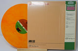 Orange marbled 'Eve' vinyl record by Speed, Glue & Shinki with beige album back and obi strip