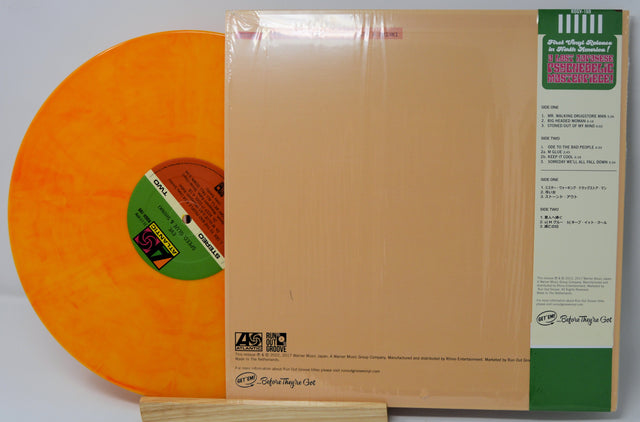 Orange marbled 'Eve' vinyl record by Speed, Glue & Shinki with beige album back and obi strip