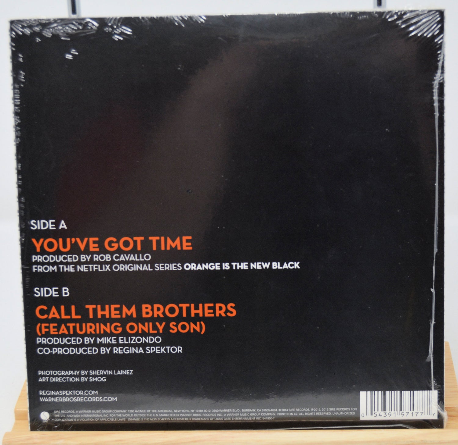 Vinyl record sleeve with text on a white background