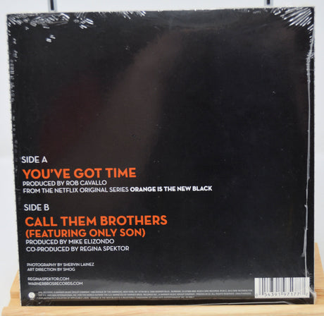 Vinyl record sleeve with text on a white background
