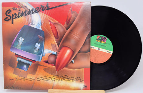 Vinyl record with cover featuring a hand with red nails and a small electronic device, on a white background.