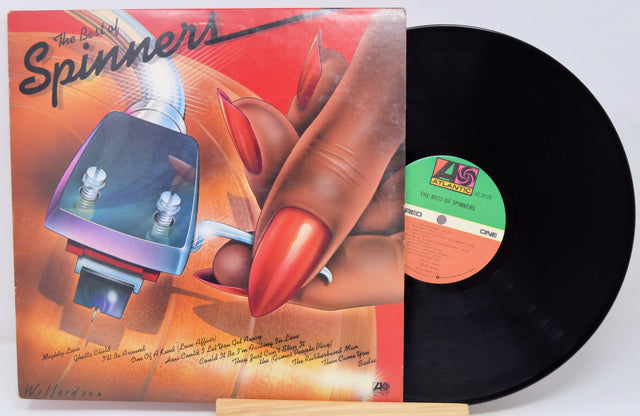 Vinyl record with cover featuring a hand with red nails and a small electronic device, on a white background.