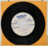 Vinyl record with a yellow sleeve on a white background