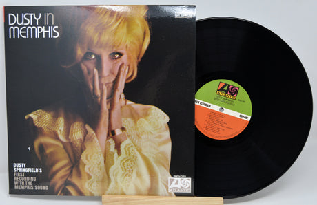 Vinyl record with cover featuring a woman's face and 'Dusty in Memphis' text.