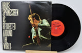 Vinyl record with cover featuring Bruce Springsteen and text 'As Requested Around the World'.
