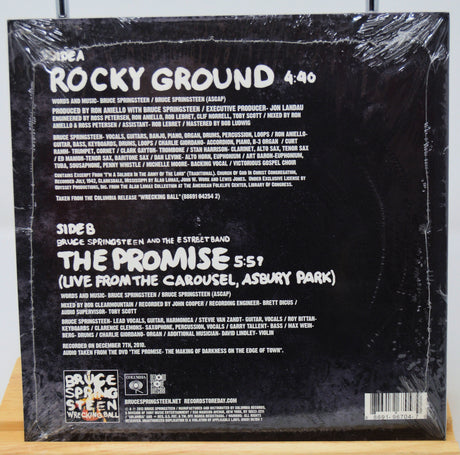 Back cover of a vinyl record with text and album details.