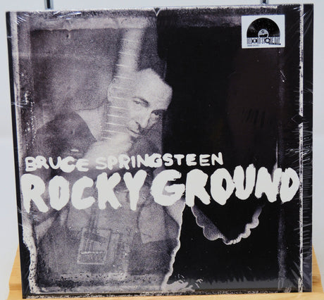Vinyl record cover for Bruce Springsteen's 'Rocky Ground' with black and white design.