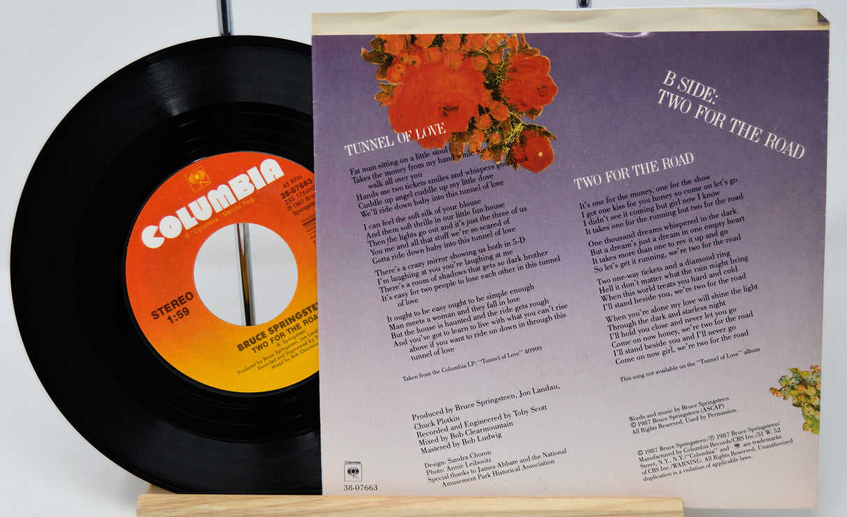 Vinyl record with Columbia label and matching record cover on a white background