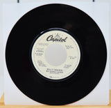 Vinyl record with Capitol label on a white background