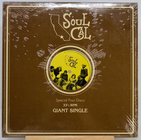 A sealed vinyl record sleeve for the Soul Cal 'Special Pour Disco' 33 1/3 RPM Giant Single, featuring a brown cover with a yellow record graphic and cream text, photographed on a light background.